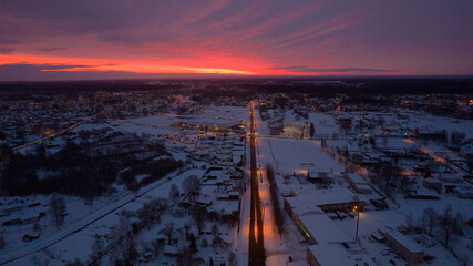 Afterglow over Dramatic Sky at Sunrise. Colorful sky at dawn with a serene and scenic landscape. Cityscape at Sunset with Beautiful Sky and Urban Landscape