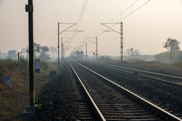 Fototapeta na wymiar The Solapur Mumbai Vande Bharat Express Train heading towards Mumbai, near Pune India.
