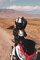 girl posing on a motorcycle