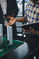 Real estate brokerage agent Deliver a sample of a model house to the customer, mortgage loan agreement Making lease and buy and sell house And contract home insurance mortgage loan concept