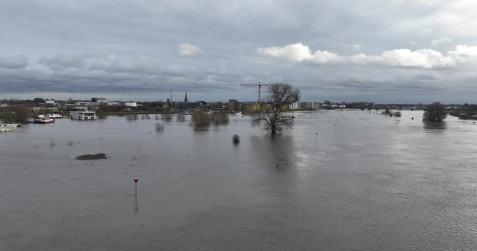 Aerial view on flooding of the river Ijssel. Climate change, heavy rainfall and excessive water.