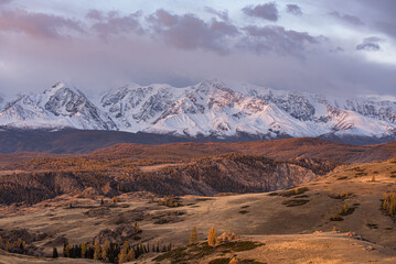 Altai Republic. North Chuysky ridge. Mountains covered with snow during sunrise. Mountain landscape.