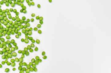 fresh green peas on a white background.