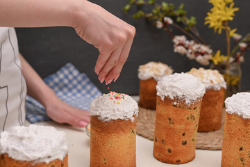woman preparing Easter cake for Easter at home.