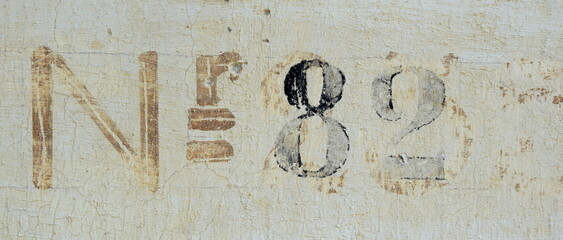 82 in old scriptold house wall