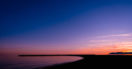 Sunset Sky,Cloud over Sea Beach in Evening on Spring,Landscape by Seaside with Colourful Sky in Orange,Pink,Purple,Blue.Horizon Summer Seascape Golden hour sky with twilight,Dusk sky background