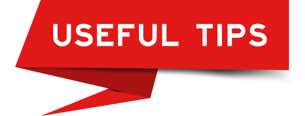 Red color speech banner with word useful tips on white background
