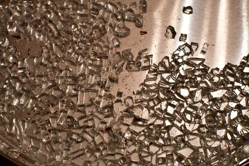 Shattered Glass on a Silver Background