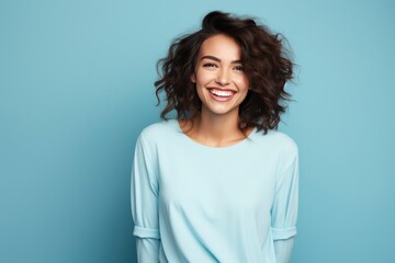 Naklejka premium Photo of attractive brunette young woman wearing casual clothes standing isolated over blue background