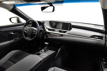 Car interior: dashboard, multimedia, steering wheel.
