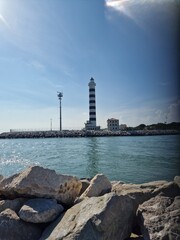 Fototapeta na wymiar Italy. Lido di Jesolo.Lighthouse.