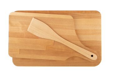 Top view of a kitchen set of wooden cutting boards and a kitchen spatula.