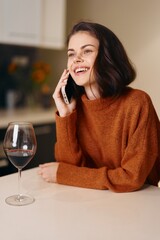 Modern Female Using Smartphone for Online Communication in a Casual Café