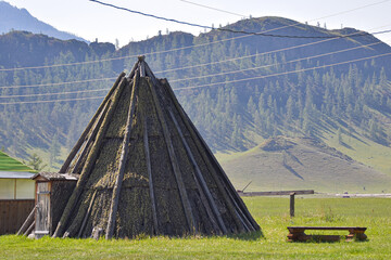 The yurt is made of wood, the roof of the yura is covered with tree bark.