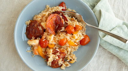 plate of basmati rice with shrimp and chorizo on the table