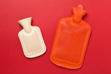 Rubber water warmer bag on color background