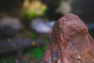 top of red granite boulder. Copy space left