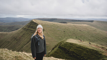 woman looking at the mountains