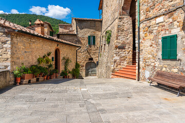 The beautiful village of Castelnuovo Val di Cecina on a sunny summer morning. Province of Pisa, Tuscany, Italy. 