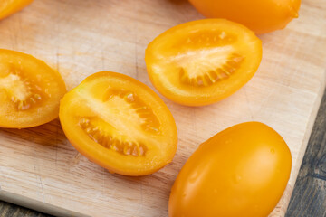 oval sweet yellow tomato, close up