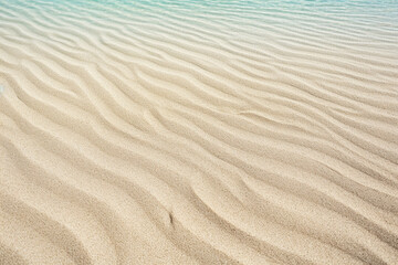 Fototapeta na wymiar A very beautiful beach with light sand and a paradisiacal beach sea