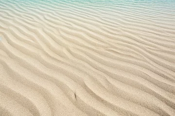 Foto op Plexiglas A very beautiful beach with light sand and a paradisiacal beach sea © amirhamzaaa