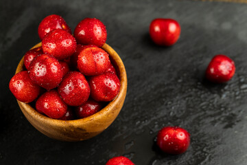 covered with drops of water delicious sweet cherries