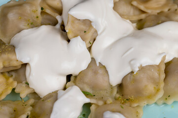 small dumplings with wheat flour and pieces of meat