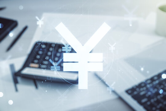 Abstract virtual Japanese Yen symbol hologram on blurry calculator and computer background, forex and currency concept. Multiexposure