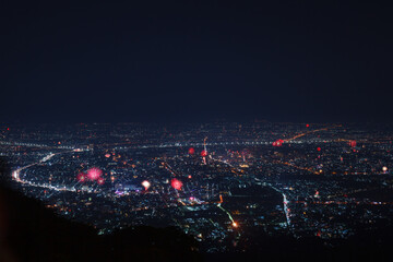 Beautiful fireworks Happy New Year at Chiangmai City Thailand. 