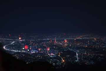 Beautiful fireworks Happy New Year at Chiangmai City Thailand. 