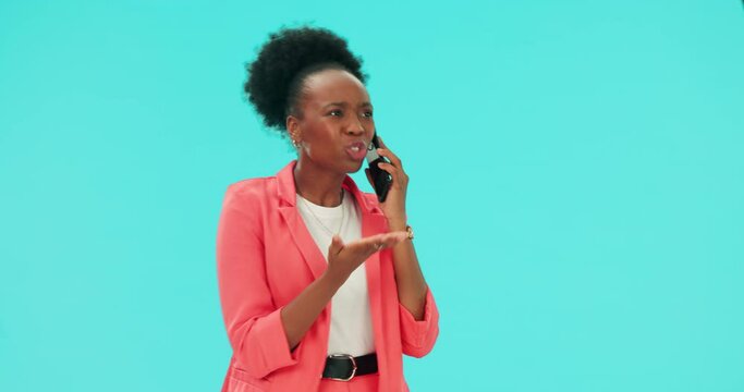 Phone call, frustration and upset businesswoman in a studio in a fight or argument communication. Technology, angry and professional African female person on a mobile conversation by blue background.