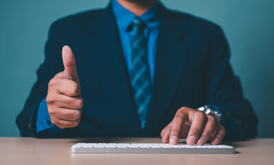 man, businessman, business, corporate, lifestyle, male, office, professional, portrait, businessperson. businessman in formal suit showing thumb up like gesture, expressing giving positive feedback.
