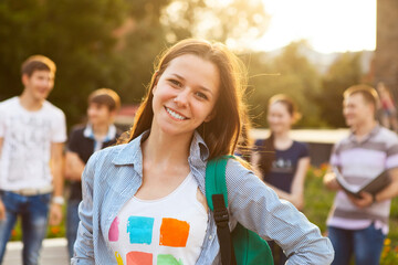 Female smiling student outdoors