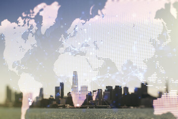 Double exposure of abstract digital world map hologram on San Francisco office buildings...