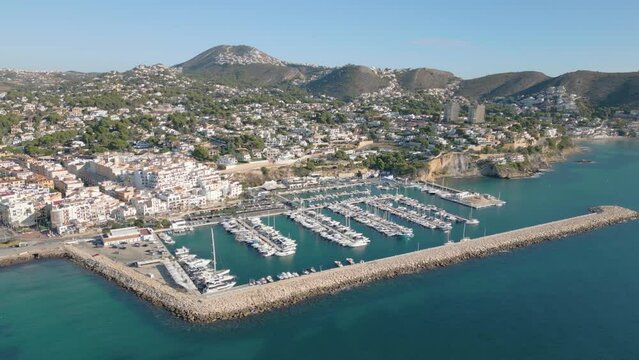 Aerial drone video of the coastal town named Moraira in the Costa Blanca, Spain