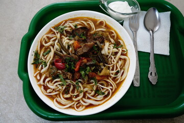 Lagman soup traditional Turkic dish served at a cafe in Russia
