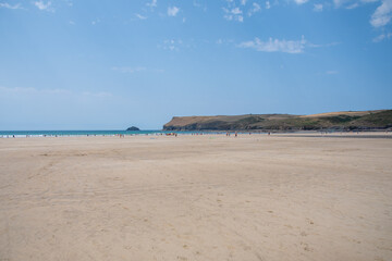 A view along the sands of Polzeath beach in Cornwall