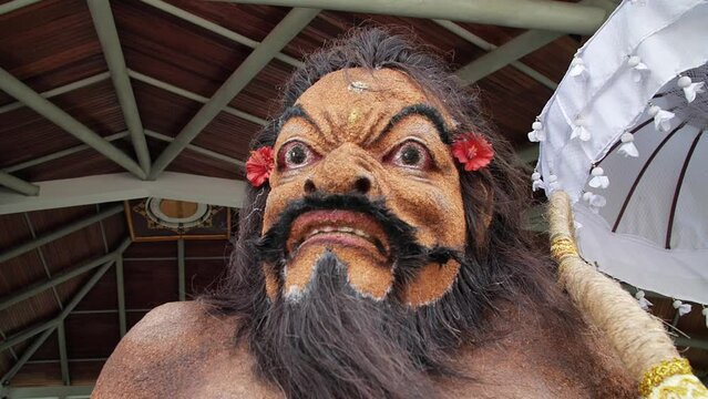 Hd slow motion footage of balinese traditional costume in Monkey forest, Ubud, Bali, Indonesia.
High angle, parallax movement.