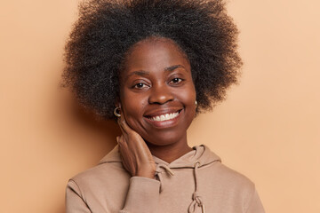 People positive emotions concept. Studio shot of young happy smiling friendly African american...