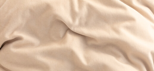 Obraz premium Beige fabric as an abstract background. Texture