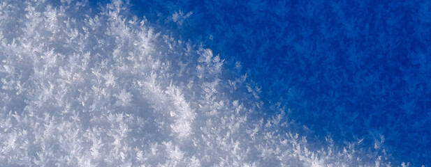 Snow Crystals from Freezing with Blue Shadows and Textures