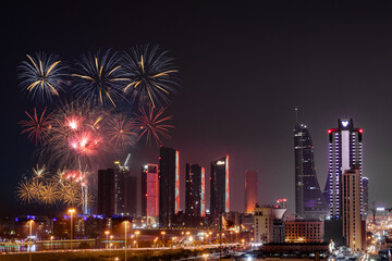 Manama, Bahrain, January 01, 2024 : Bahrain National Day Celebration fireworks with all iconic buildings in Manama, Bahrain.