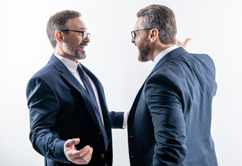 two businessmen fighting at rivalry isolated on white. businessmen having conflict fight in business. fighting between boss and employee. business fight. high competition