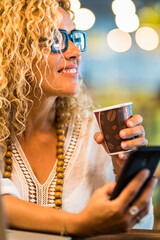 Travel job and smart working concept lifestyle with  young adult pretty woman use phone and laptopcomputer with roaming connection and free wifi airport gate bar cafe