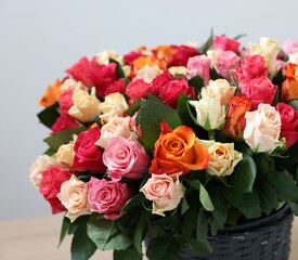 Bouquet of beautiful roses on light background