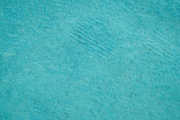 background of blue Huun Mayan handmade paper created in Mexico