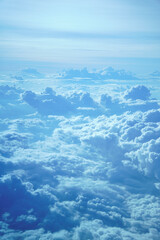 Fototapeta na wymiar Cotton candy like clouds floating on the endless blue sky background