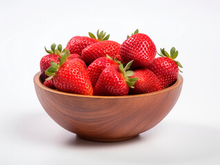 Strawberries in a wooden bowl on a white background, isolated
