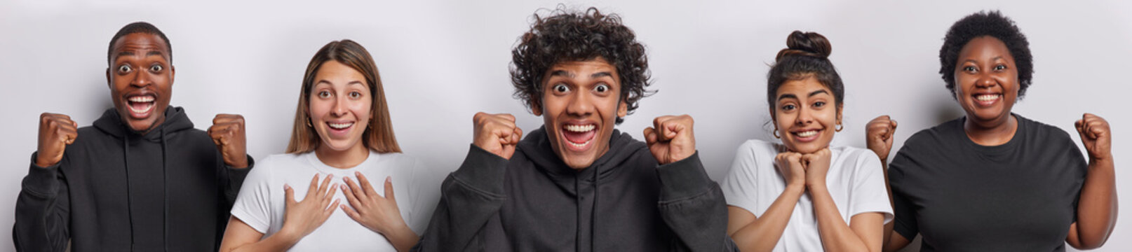 Horizontal shot of amazed cheerful Hindu man with curly hair and dark skinned guy clench fists celebrate success smile gladfully and react to something incredible isolated over white background